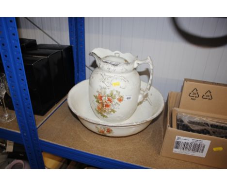 A late Victorian floral decorated toilet jug and basin