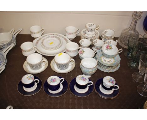 Four Royal Worcester coffee cans and five saucers;  Royal Albert "Enchantment" teaware; Royal Albert "Lorraine" patterned tea