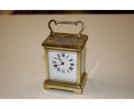 A brass cased carriage clock retailed by Penlington &amp; Batty Liverpool and Manchester 