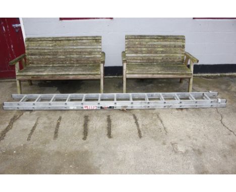 An aluminium double extending ladder