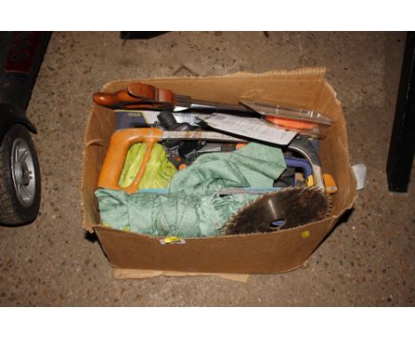 A box containing various tools etc