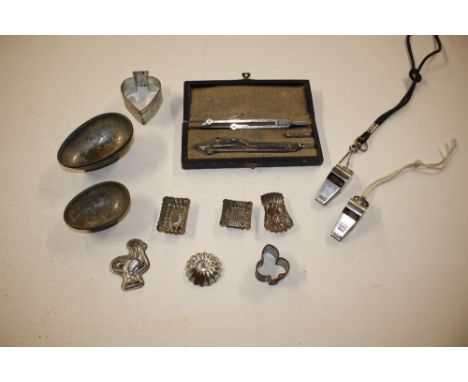 Two whistles, vintage pastry cutters, cased part geometry set etc. 
