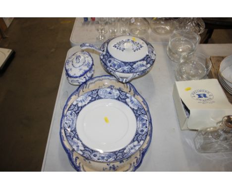 A blue and white soup tureen, ladle and stand; another tureen  AF; and an oval meat plate AF