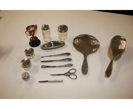 A small collection of silver dressing table items to include mirror, brush, nail buffer, tidy pots, manicure items etc.; a si