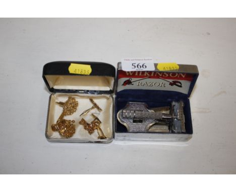 A boxed Wilkinson razor and three pairs of decorative cufflinks