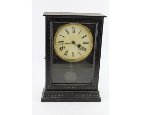 A vintage German mantel clock, pendulum and key present. Height 33.5cm.