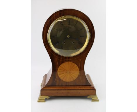 A French Edwardian inlaid mahogany balloon mantle clock, Brass dial with Roman numeral hour markers. 'Tempus Fugit', 'Time Fl