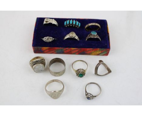 A collection of vintage and antique ladies and gentleman's silver rings to include signet ring, buckle ring and rings set wit