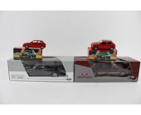 A boxed vintage die cast model No. 1511 of Ford Sierra Saphire 1:25 Scale in blue / grey and a Ford Granada scale 1:25 Model 