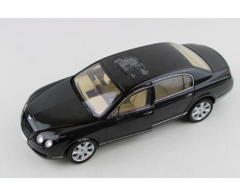Paul's Model Art or similar 'Minichamps' Bentley Continental Flying Spur in black, 1/18 scale.  Vendor states items were sour