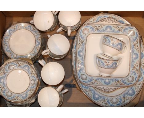 A collection of Wedgwood 'Dolphins Blue' pattern tea and dinner ware to include four 36cm x 28cm oval serving plates, two 18c