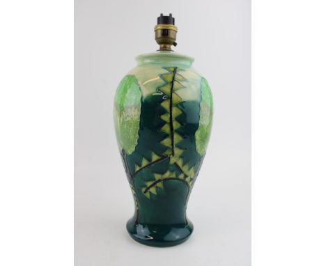 Moorcroft early lamp base, bulbous, tree design, 31.5cm tall.  In good condition with no obvious damage or restoration.