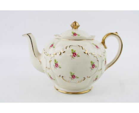 Sadler globe teapot, decorated with pink roses.  In good condition with no obvious damage or restoration. Stained crazing to 
