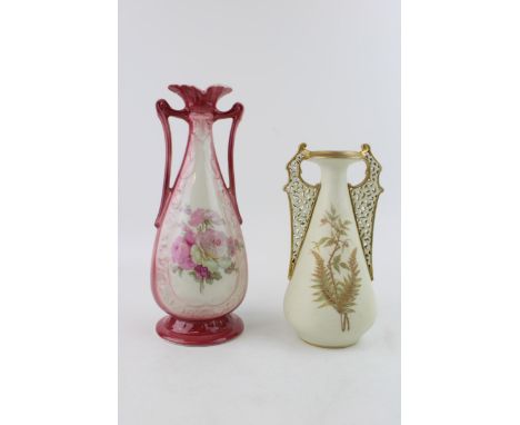 A Graingers of Worcester reticulated vase with floral decoration, and a Rockingham vase (2), tallest 25.5cm.  Generally good 