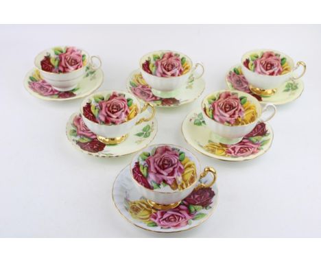A collection of Aynsley cups and saucers, primrose yellow and pink ground with pink rose / cabbage rose design in varying col