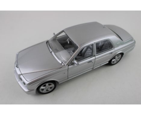 Paul's Model Art 'Minichamps' Bentley Arnage T in silver 1/18 scale.  Vendor states items were sourced from the Bentley Desig