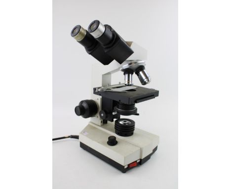 A 'Zenith' Ultra - 500LA binocular microscope. Height 36cm.  Untested.