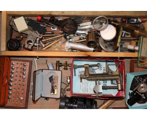 A mixed collection of watchmakers and jewellers tools and accessories to include a boxed 'Eclipse Instrument Vice' a 'Vertita