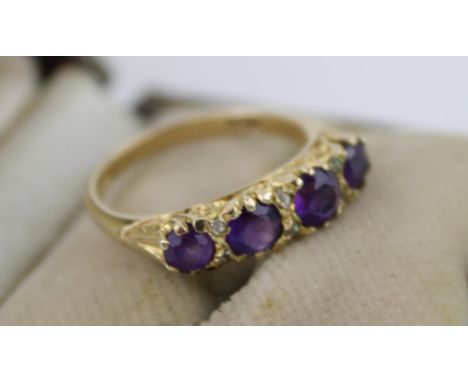 Four stone 9ct yellow gold ring set diamonds in vintage ring box. Ring size M - N. Weight 2.8g