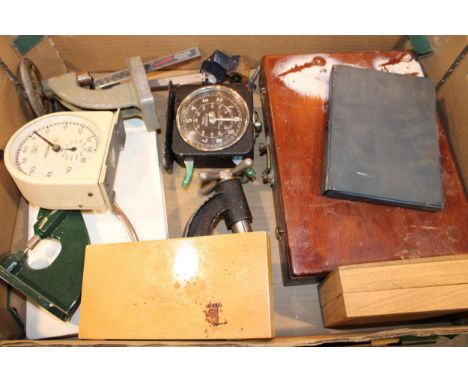 A collection of watchmakers tools and accessories to include watch crystal presses, lathe attachments, callipers and various 