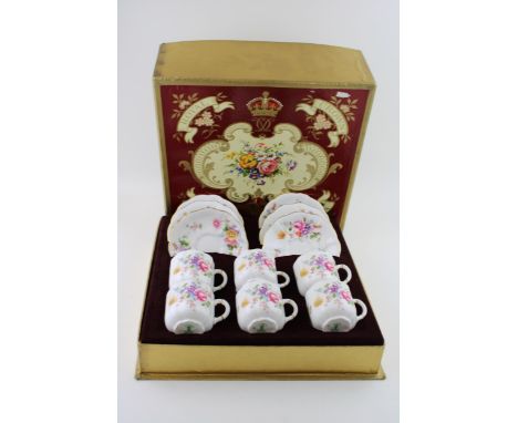 Boxed Royal Crown Derby 'Derby Posies' to include 6 cups and 6 saucers (12).  In good condition with no obvious damage or res