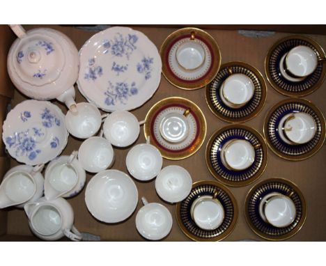 A collection of Coalport tea ware in the 'Divinity Blue' pattern to include tea pot, six trios, two cream and a sugar bowl, (