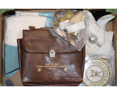 A collection of Masonic items to include leather satchel, sash, buttons, badges and similar items. (Qty)
