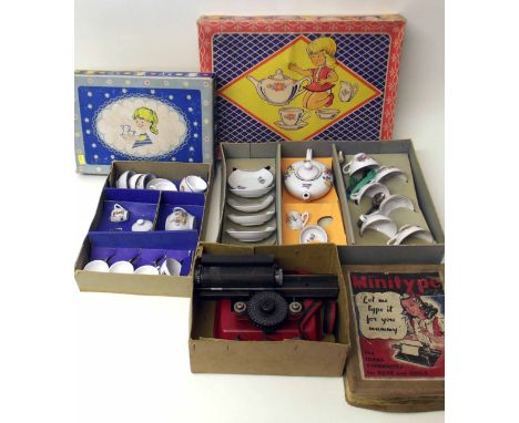 Minitype child's boxed typewriter also two boxed child's tea sets. Condition report: see terms and conditions