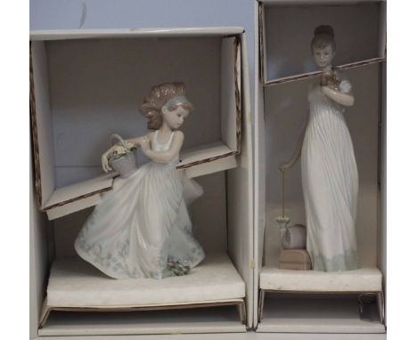 Two Lladro boxed figures, to include Floral Path, and Travelling Companions.     From the shop clearance of Stoniers Liverpoo