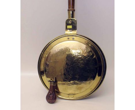 Brass warming pan and embossed copper powder flask. Condition report: see terms and conditions