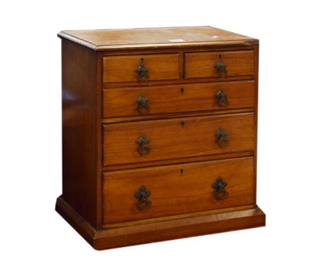 Late Victorian light mahogany 'apprentice' piece chest of two short over three graduated long drawers on plinth base with Aes