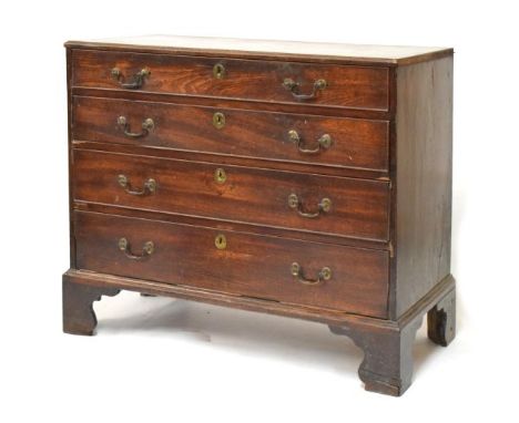 George III mahogany chest of four long drawers, the moulded rectangular top over cockbeaded drawers with brass swan neck bale