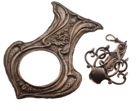 Victorian silver chatelaine clip, London 1871, together with an Edward VII embossed silver clock face mount having floral dec