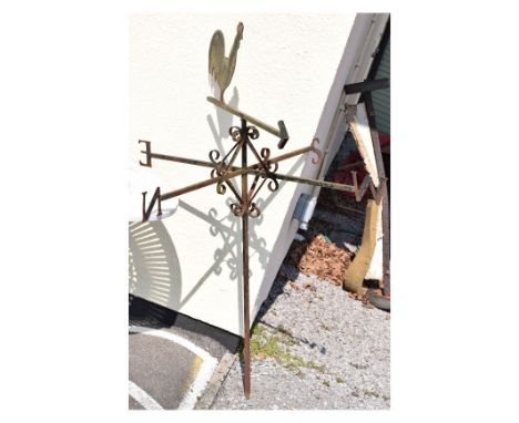 Wrought iron weather vane surmounted by a cockerel over scroll work and compass points on box section stem, 107cm diameter x 