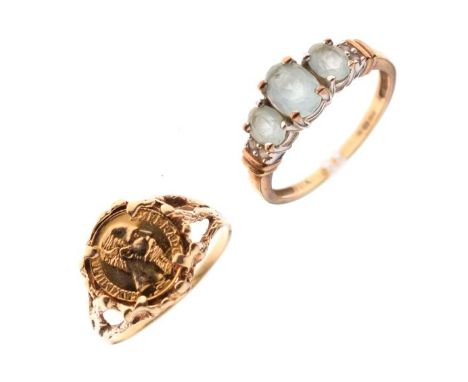 9ct gold dress ring set three graduated pale blue stones with diamond shoulders, size Q and a gold coloured metal dress ring 