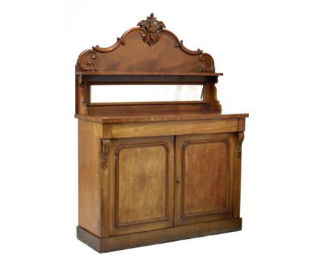 Victorian mahogany chiffonier, with scroll carved pediment over shelf and mirror, the lower stage with rectangular top over t