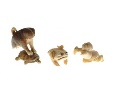 Early 20th Century ivory netsuke of a dog with his paws on a turtle and one other early 20th Century carved ivory figure of a