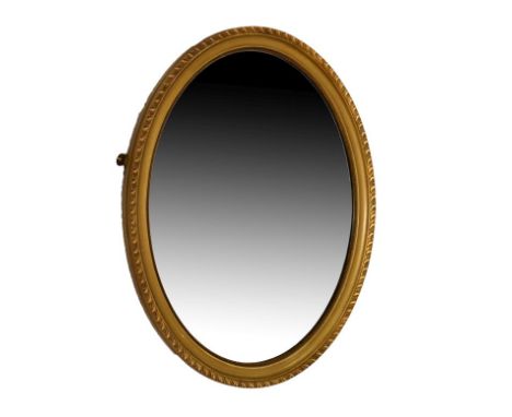 Early 20th Century gilt-framed oval wall mirror having a bevelled plate within gadrooned surround, 57cm high   Condition: 