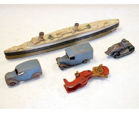 Chad Valley unique 'take to pieces' model of RMS Queen Mary, a Tootsie toy die-cast armoured vehicle etc   Condition: 