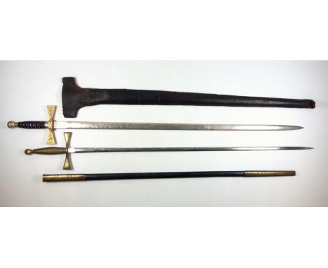 Masonic sword with an engraved steel blade and wire bound gilt metal hilt in leather scabbard, by Wilkinson Sword, L.91.6cm; 