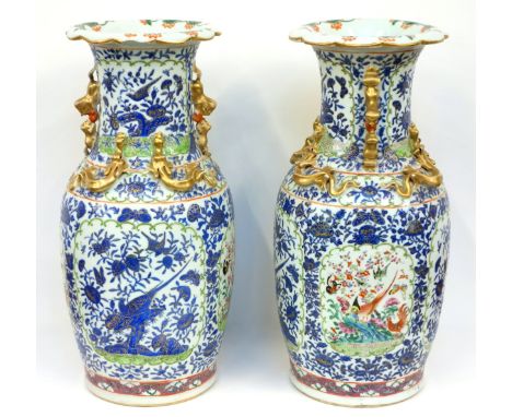 Pair of Late 19th Century Chinese, (Late Qing), porcelain vases, each of baluster form with 2 reserves of painted Famille Ros