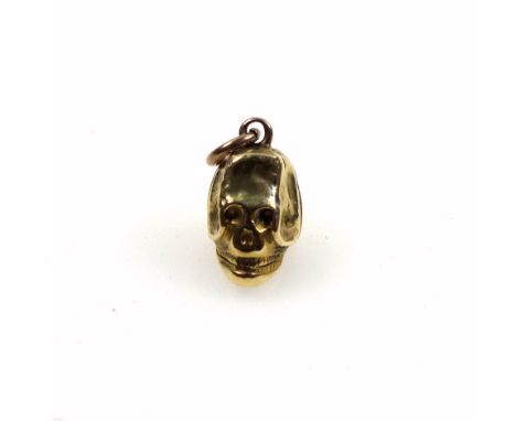 Late 18th century miniature gold skull pendant, with a hinged back, possibly a pill box, H. 12mm, 1.58 grams