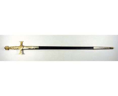 Masonic Grand Master's sword with an engraved steel blade and a decorated gilt metal hilt with crown finial, in a gilt metal 