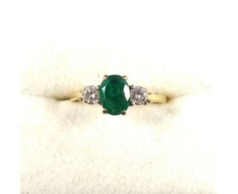 Yellow and white metal emerald and diamond ring, size K 1/2, diamonds .128ct approx., 2.7 grams 