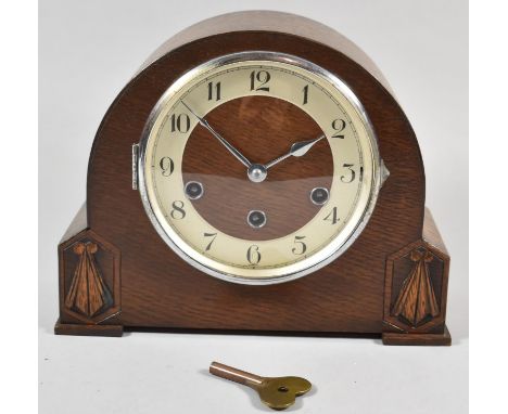 A Mid 20th Century Oak Westminster Chime Mantle Clock with Key and Pendulum 