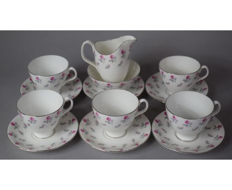 A Royal Albert Floral Pattern Part Teaset to comprise Six Saucers, Five Teacups and a Jug 