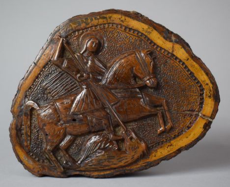 A Carved Wooden Icon Formed From a Section of Tree Trunk and Decorated with St. George and the Dragon, 16cm wide 