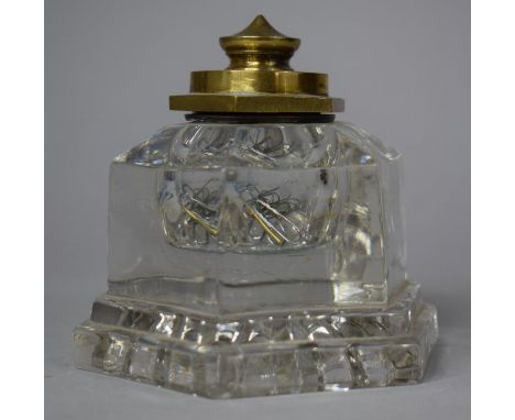 A Brass Mounted Hexagonal Glass Desktop Inkwell, 9.5cm high 