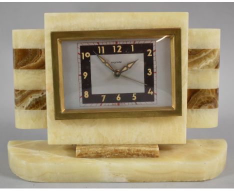 A French Art Deco Alarm Clock with Banded Decoration, Plinth Base 21.5cm wide 