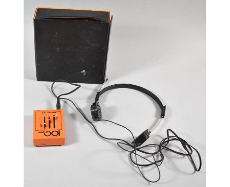 A Vintage Pocket Amplifier with Headphones 